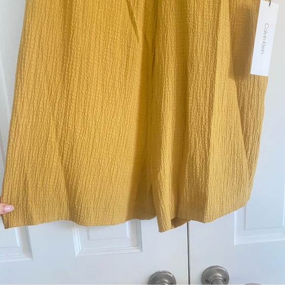 Calvin Klein Mustard new with tags romper with bell sleeves - Picture 6 of 7